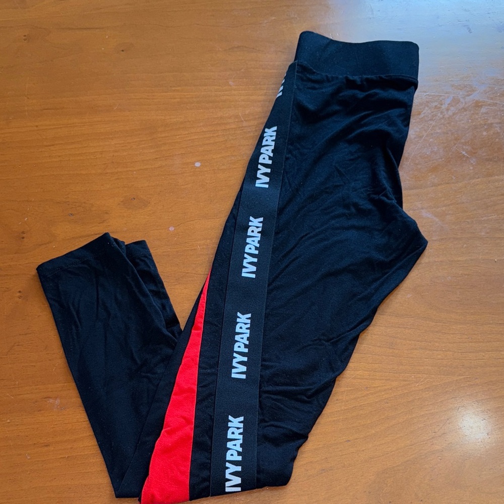 IVY PARK Leggings in Black with Red Stripe